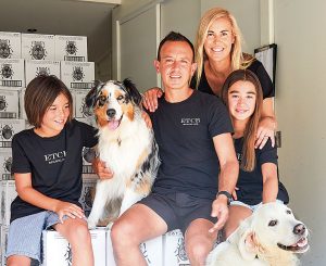 Etch Sparkling founders Jason and Andy Quin (centre) with their kids Maya and Darby